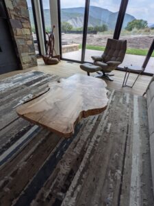 Live edge coffee table made from an elm slab and steel legs